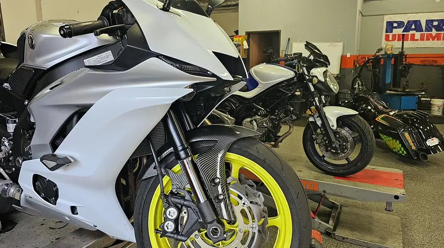 Sport bikes and metric motorcycles in the MTC service shop
