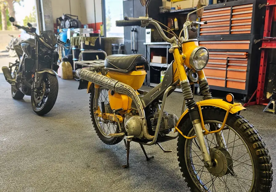 Vintage Honda CT90 and modern sport bike at Motorcycle Tire Center Orange CA